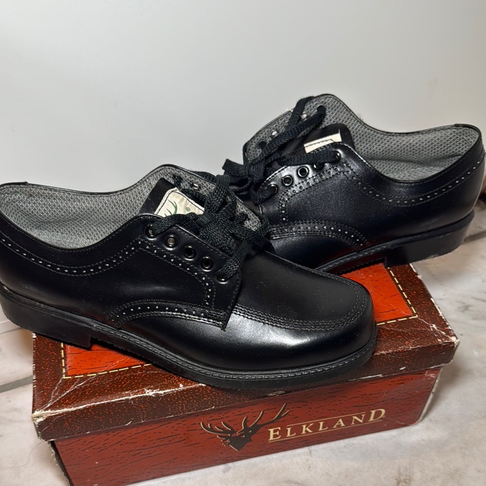 Classic Black Wingtip Oxfords with Broguing